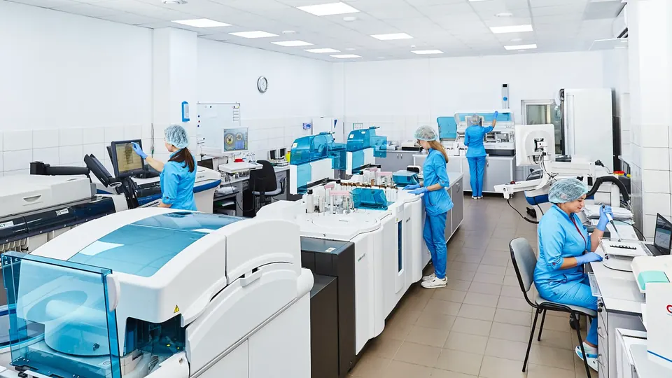 Scientists at work in a testing laboratory